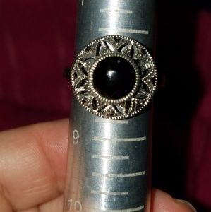 Size 7 sterling silver ring with black insert.